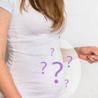 woman with questions about pregnancy.