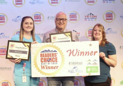 Best obgyn Idaho Falls award received for Rosemark by Dr. Steve Robison, Reagan Pemberton, and Teja Hartill from the Post Register.