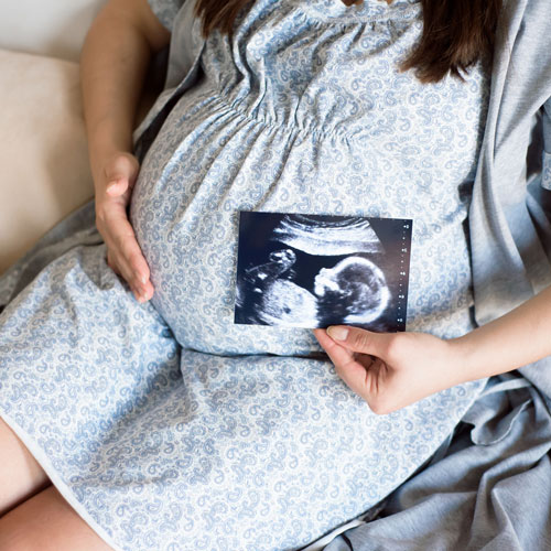 holding an ultrasound.